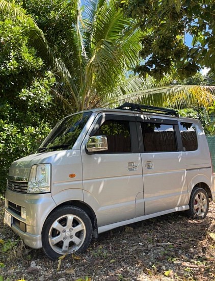 Suzuki kei car Automatic ,Aircon • 4–5 seats  Large luggage space